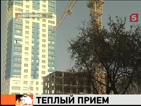 Видеоновость: В Новосибирске семьи переселили из бараков в новые квартиры