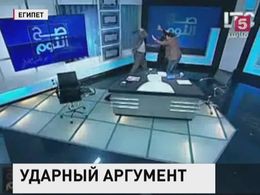 Австралийский имам получил ботинком по голове в прямом эфире Австралийский имам получил ботинком по голове в прямом эфире